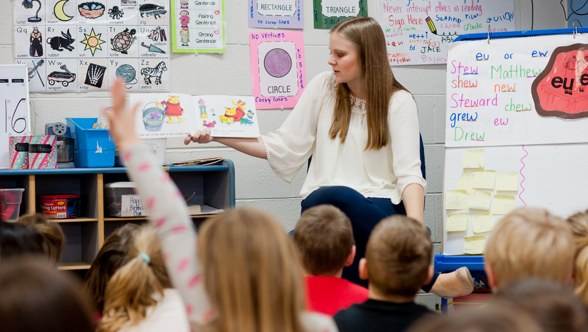 Elementary Education Student-Teacher in classroom with kids