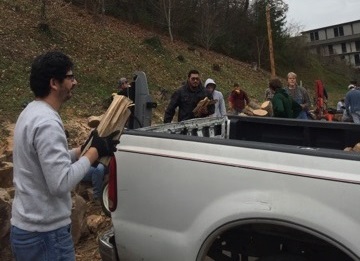 Intercultural Dialogue group cutting and delivering wood